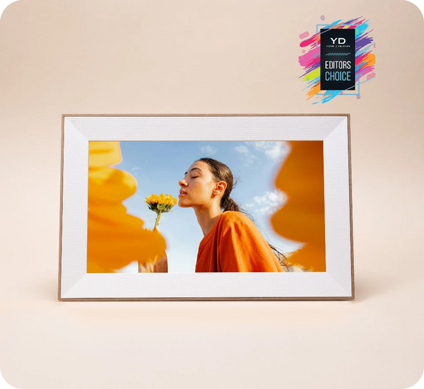 Digital photo frame displaying a woman with a flower against a colorful background, with 'Yanko Design' brand logo.