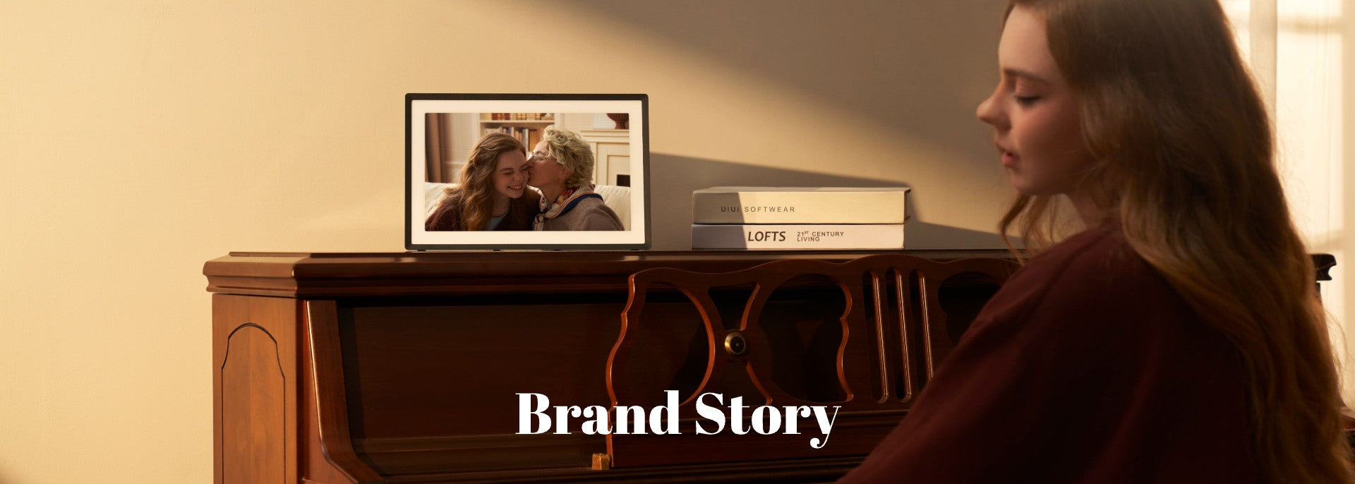 pexar digital picture frames on a wood table and show a photo of a
girl and her grand mother