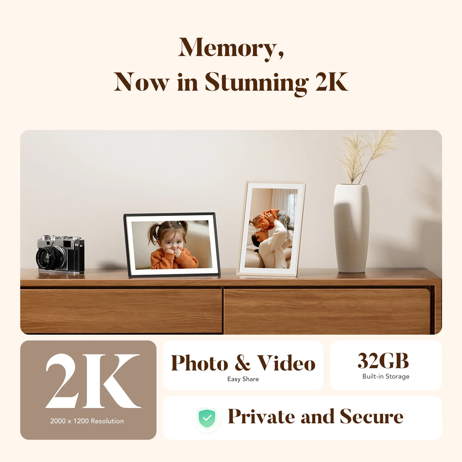 Sand and white 2K digital picture frames on a wood console beside a vintage camera, highlighting stunning 2K photo and video display