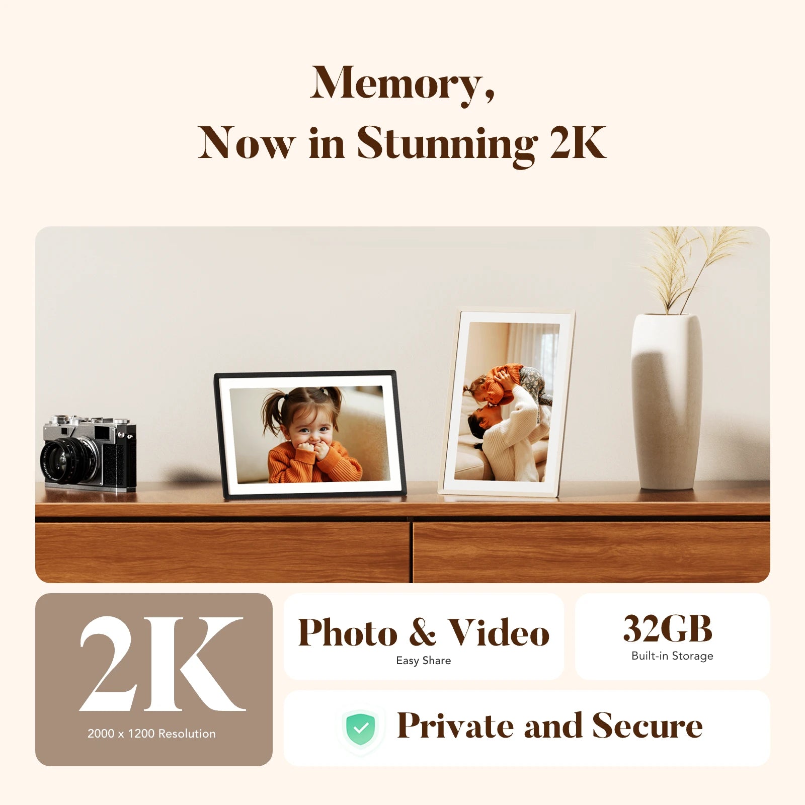 Sand and white 2K digital picture frames on a wood console beside a vintage camera, highlighting stunning 2K photo and video display