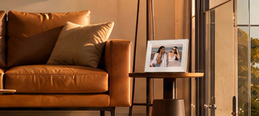 Frame on a side table beside a leather sofa